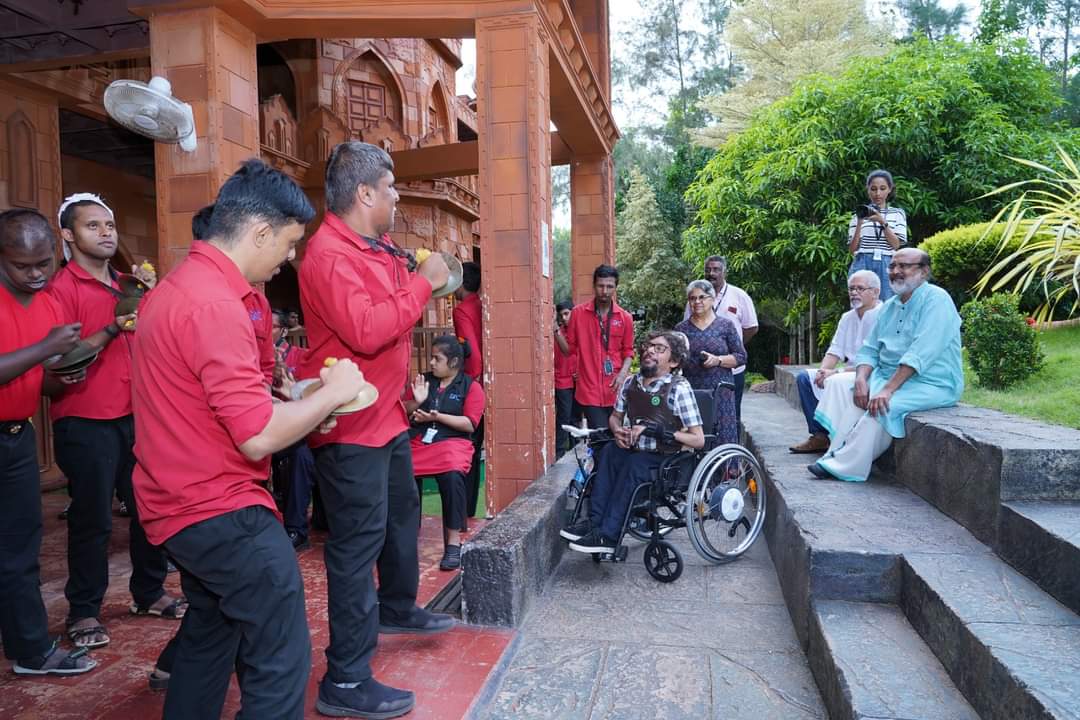 Davey Jose meeting performers and guests outside during the Kerala visit